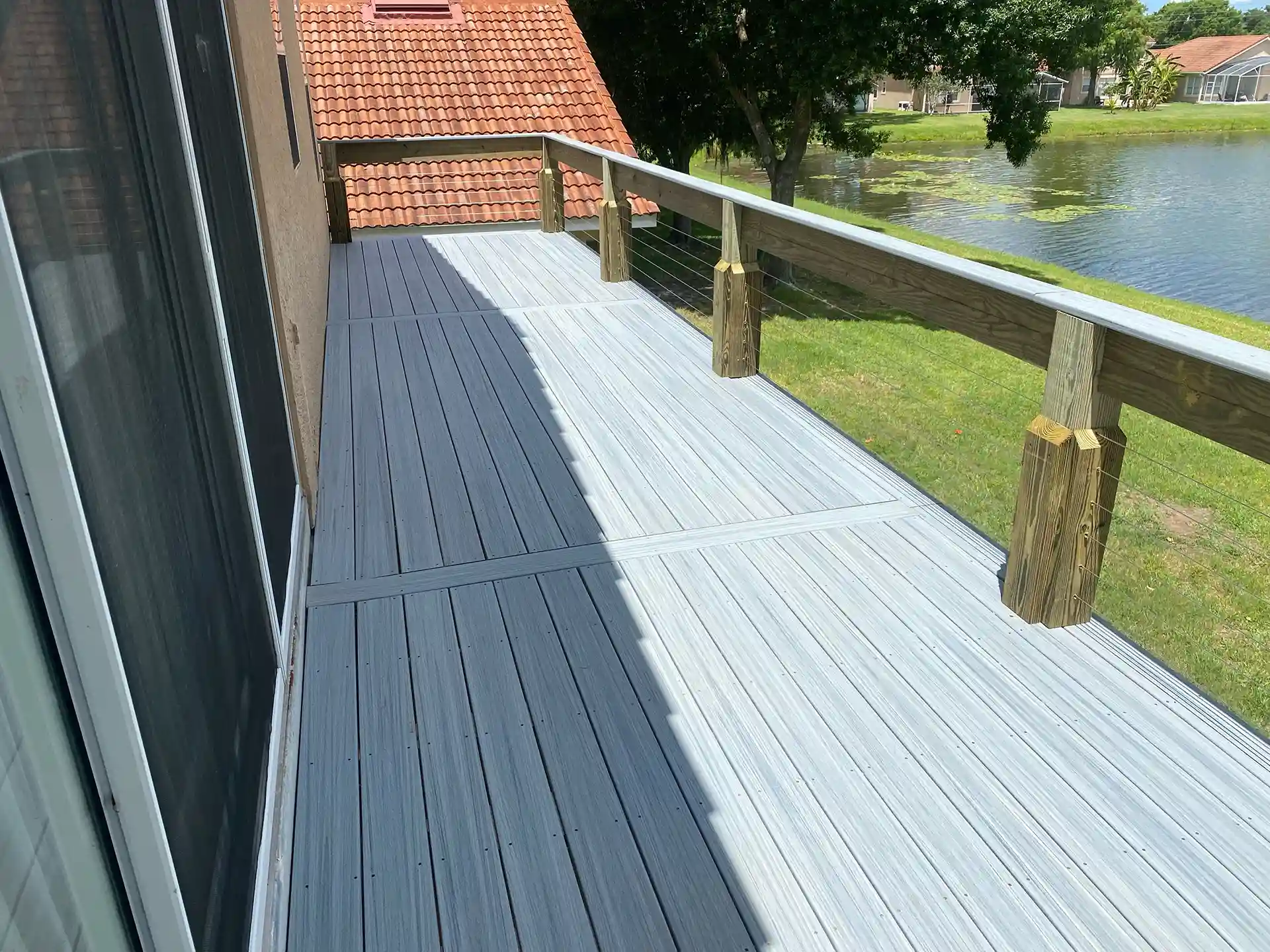 composite dock with stainless steel cable railing - Composite Decking Contractor in Central Florida - Composite Deck Building Company in Orlando Fl