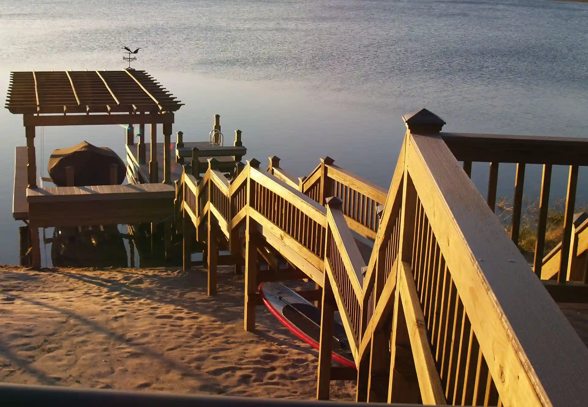 photo of deck railing and deck steps leading to a boat dock - Deck & Dock Railings contractors in central Florida