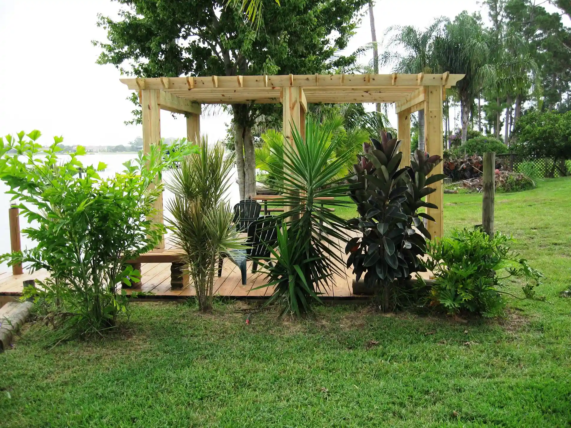 waterfront pergola with plants - Waterfront pergola - Custom pergola builders near me in central florida