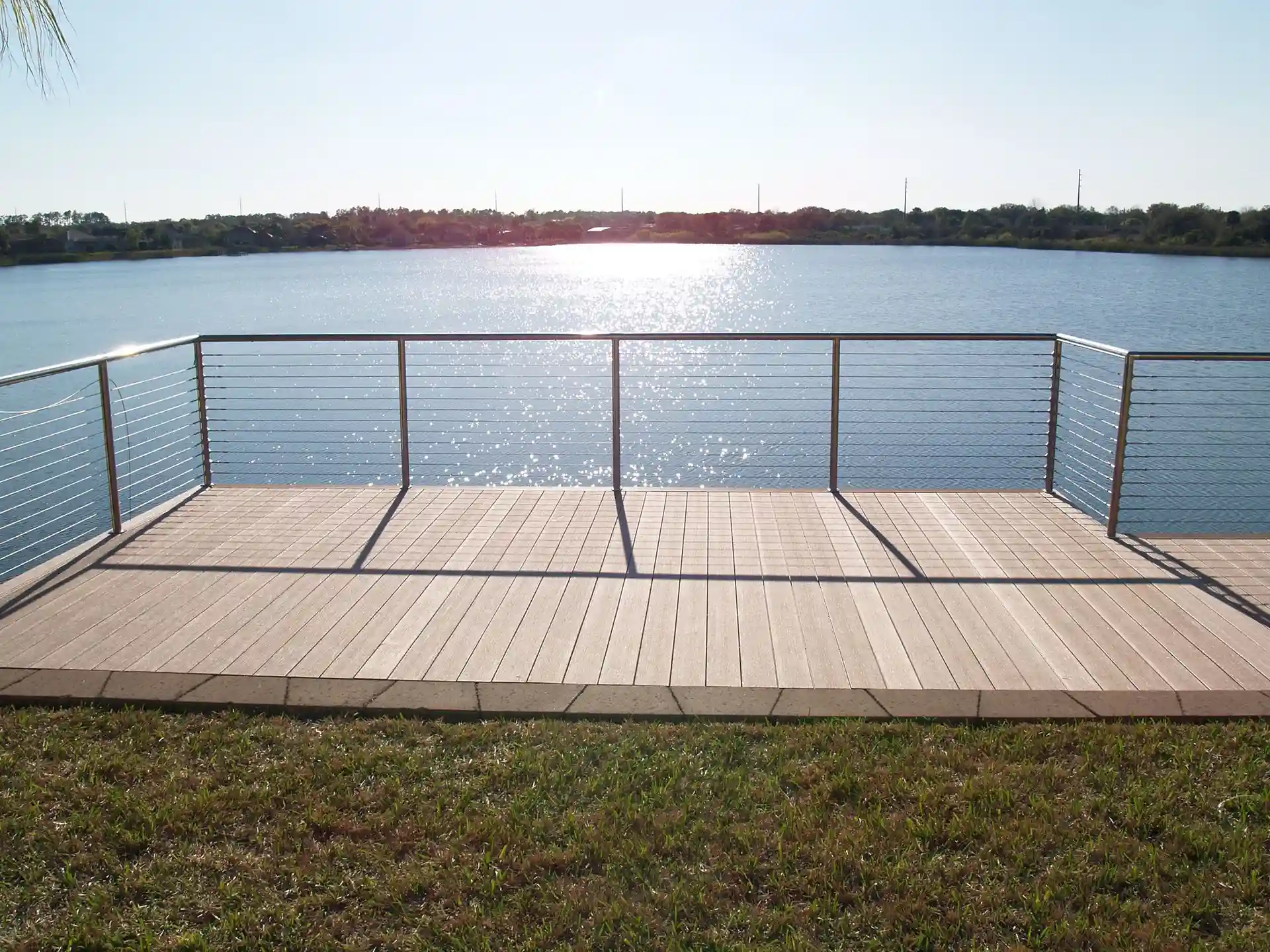 View platform along the waterfront with cable railing
