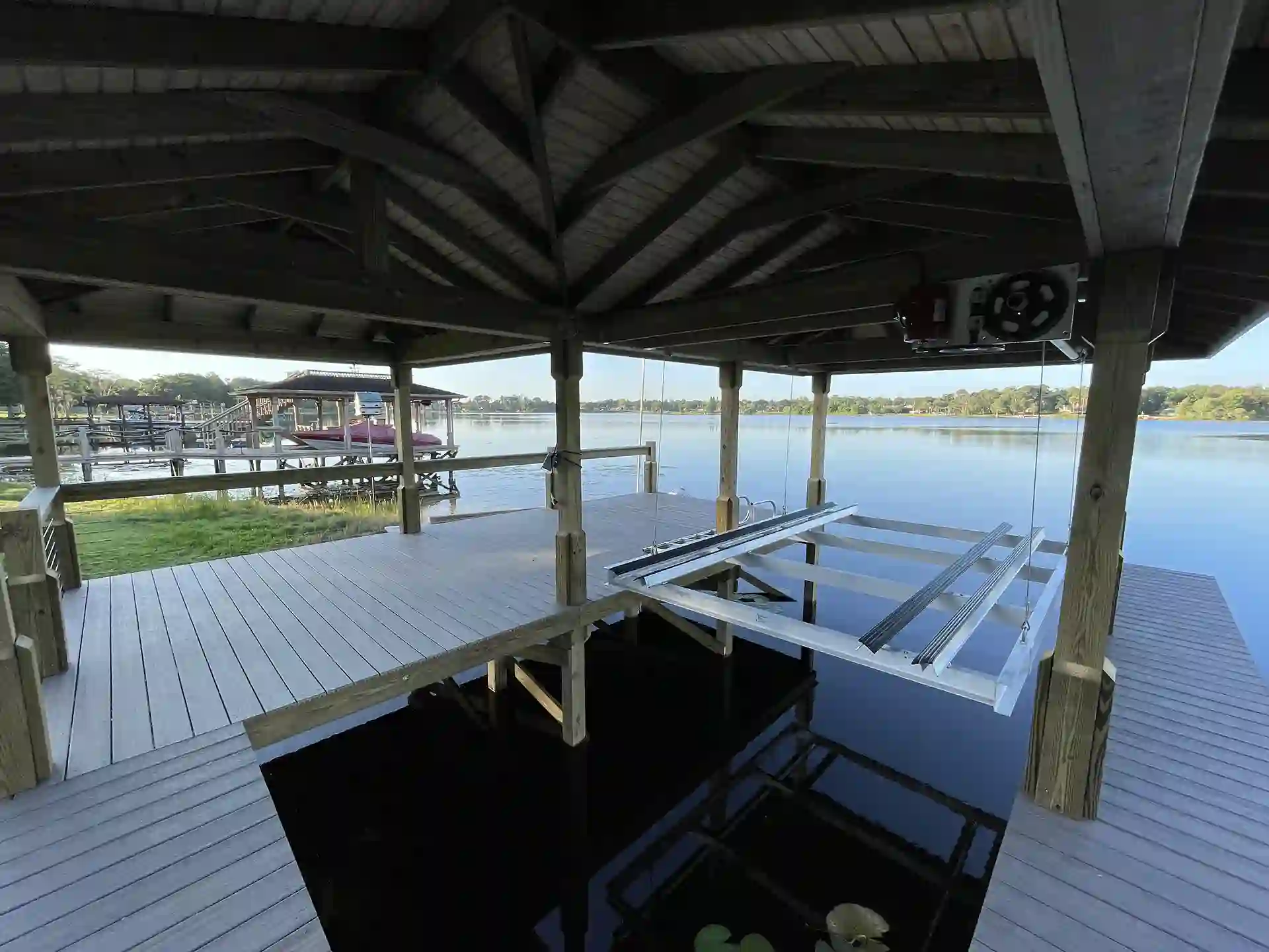 covered boat dock with a boat lift