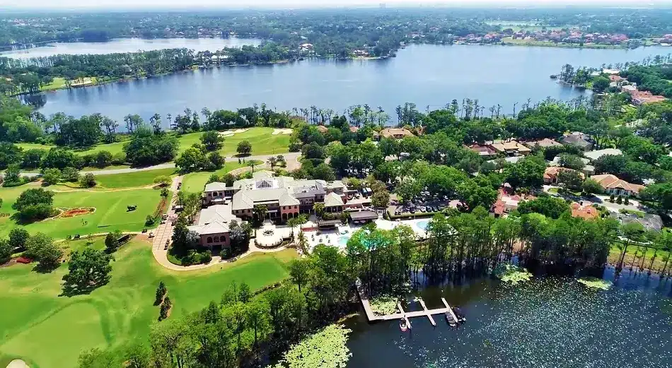 Aerial view of an Isleworth estate and dock on the Butler Chain of Lakes in Windermere, Florida